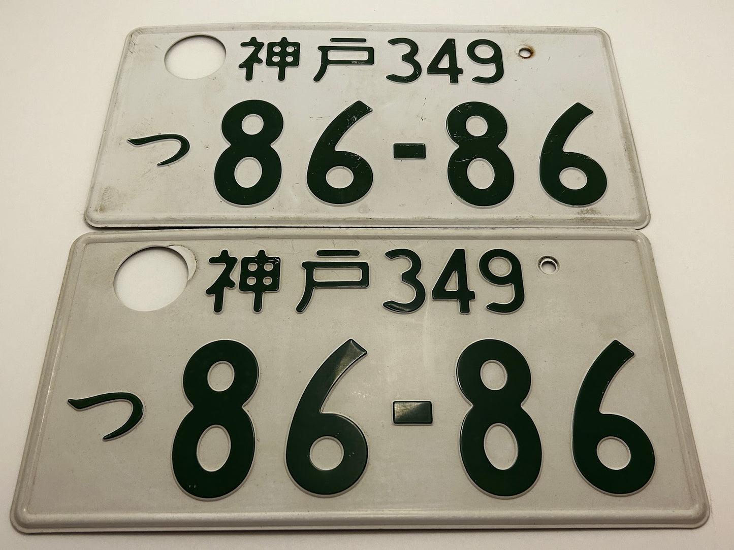 86-86 License Plates